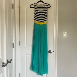 Long beautiful pleated dress with striped top.